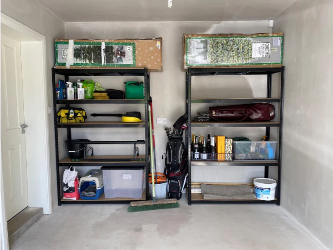 garage shelving units holding garage items