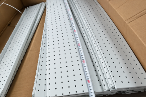 Perforated metal display panels and dimensional measurement